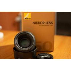 Nikon D7200 + 50 & 35mm f/1.8 + 17-70 f/2.8-4 + flitser +tas