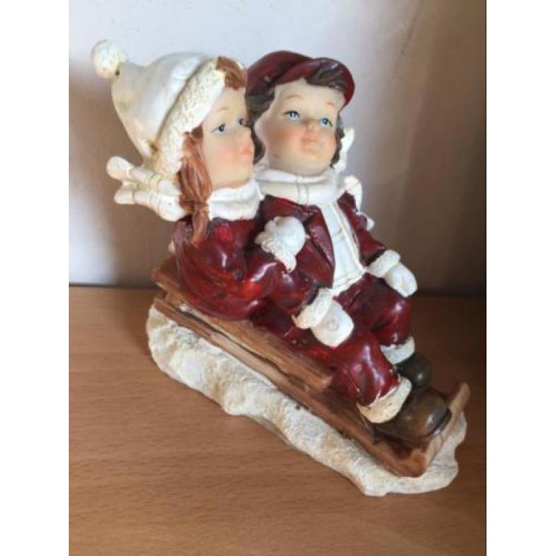 Kinderen op een slee kerst